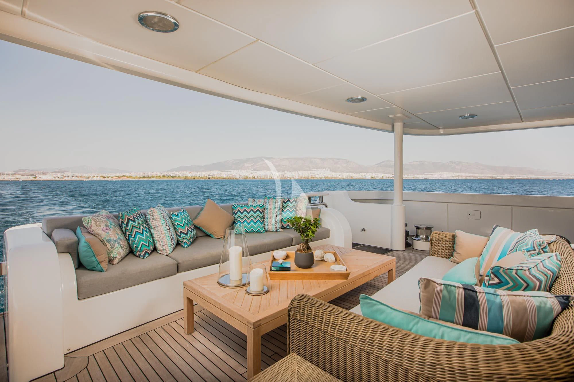 a living room with a couch and a table aboard MARLA Yacht for Sale