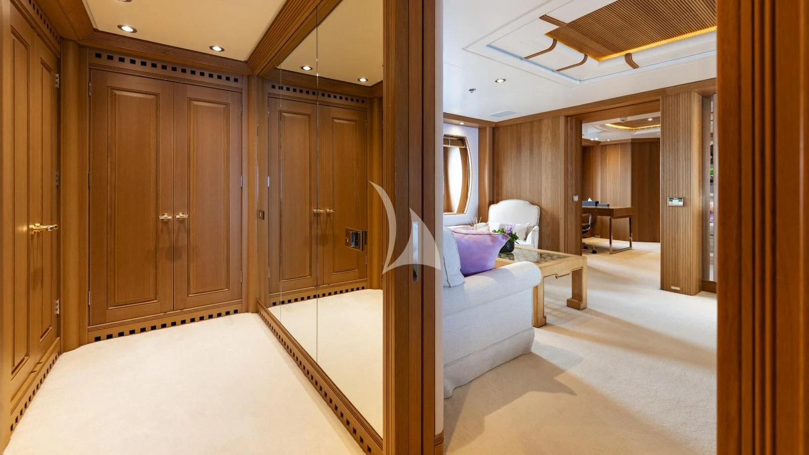 a room with a bed and a desk aboard MARLA Yacht for Sale