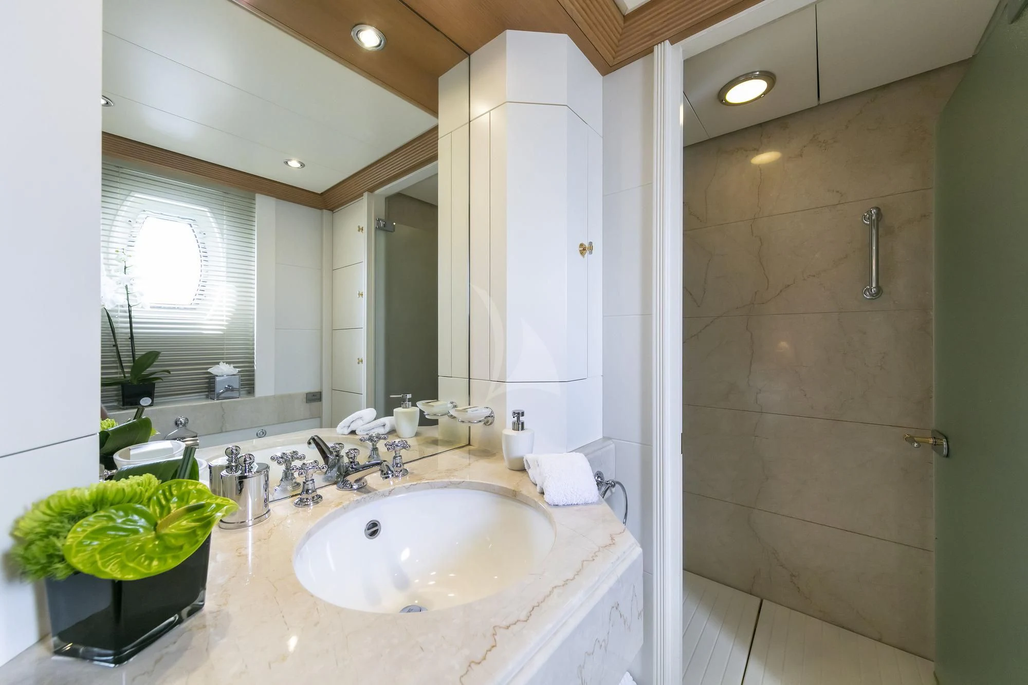 a bathroom with a large mirror aboard MARLA Yacht for Sale