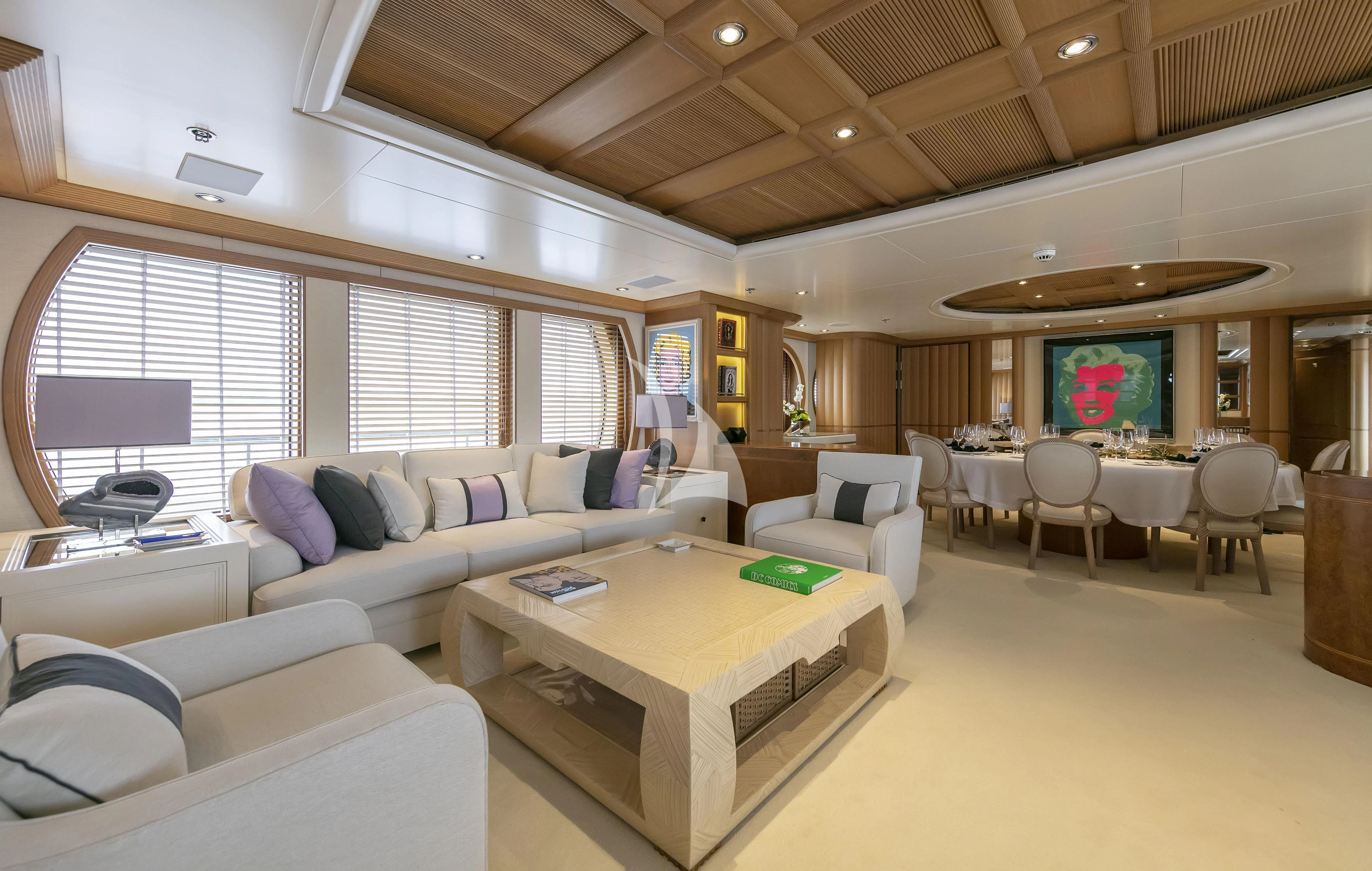 a living room with a large window aboard MARLA Yacht for Sale