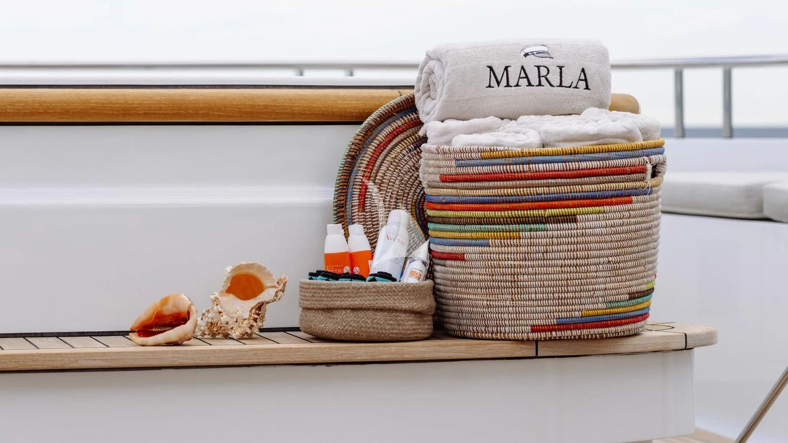 a shelf with baskets and towels aboard MARLA Yacht for Sale
