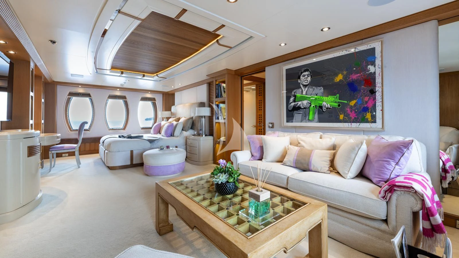a living room with a couch and a coffee table aboard MARLA Yacht for Sale