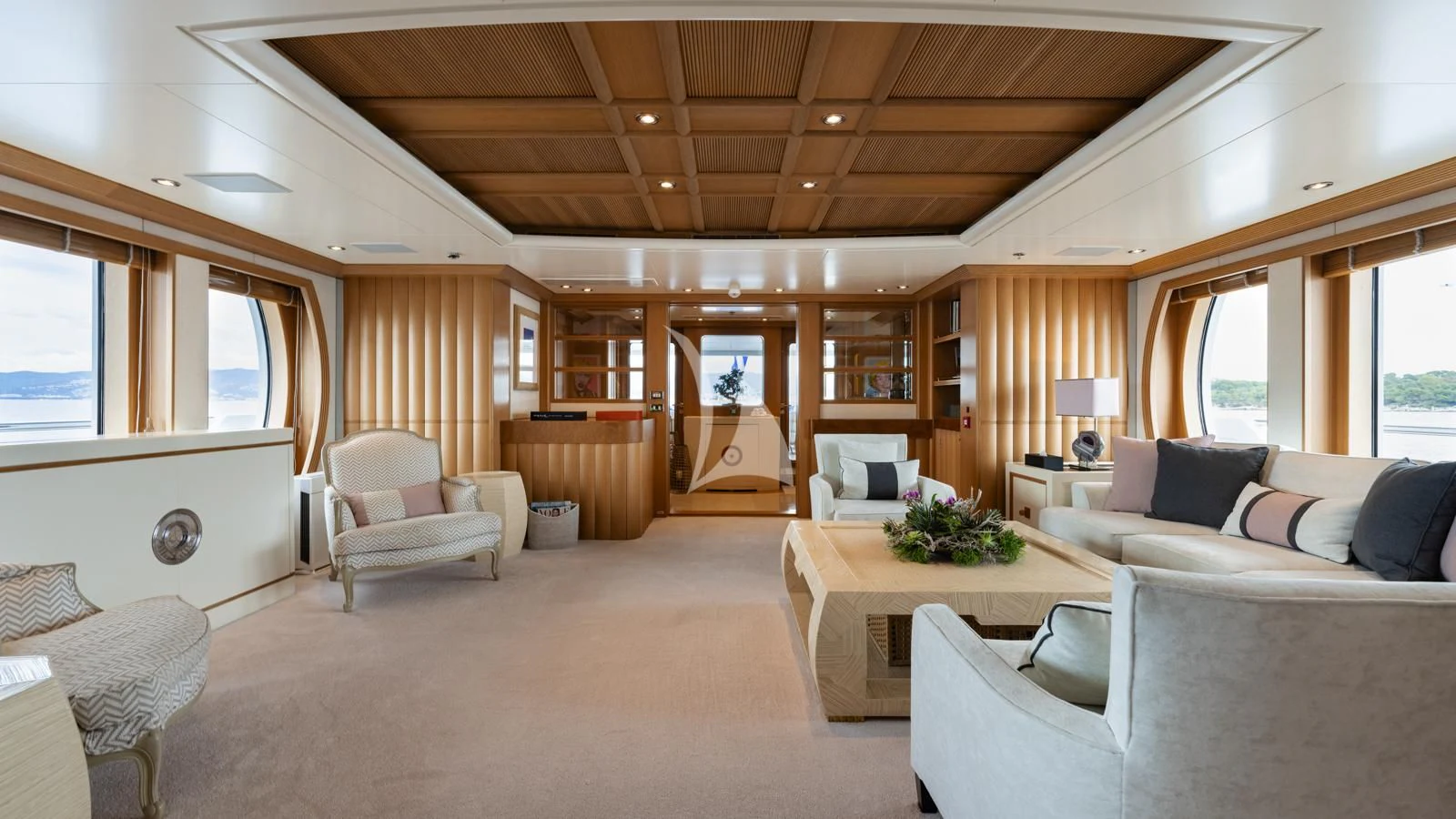 a living room with a large window aboard MARLA Yacht for Sale