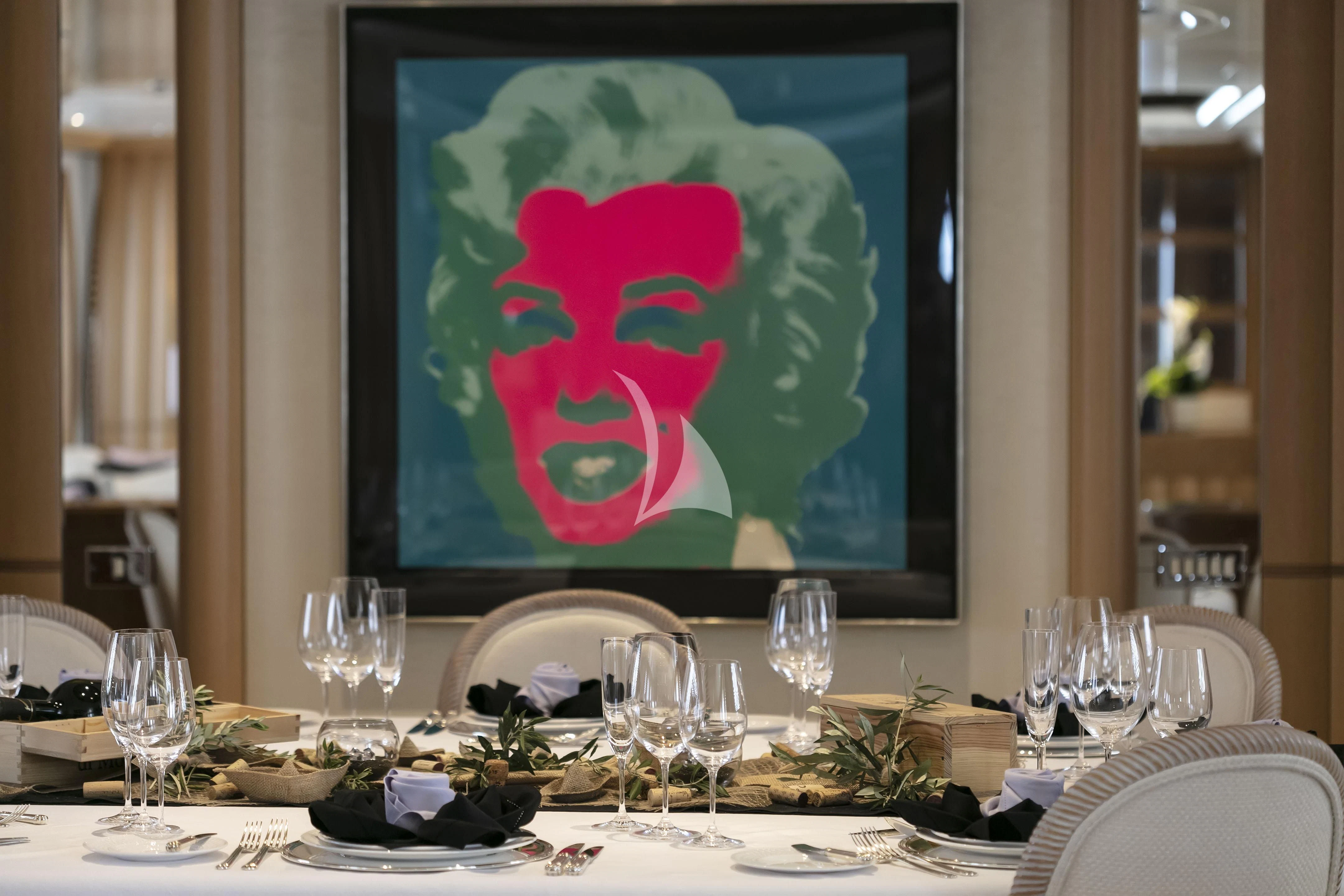 a table with a large screen aboard MARLA Yacht for Sale