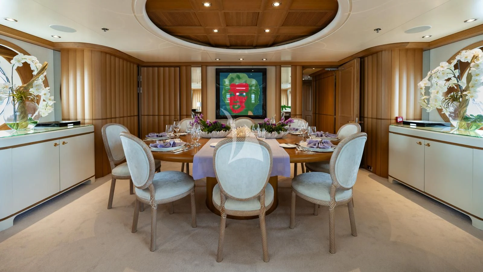 a large kitchen with a table and chairs aboard MARLA Yacht for Sale