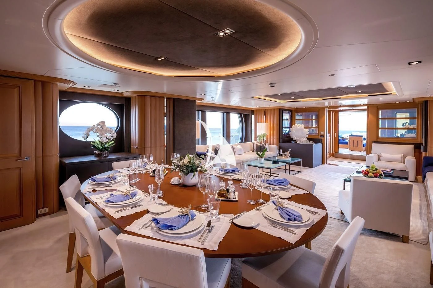 a dining room with a table set aboard DEJA TOO Yacht for Sale