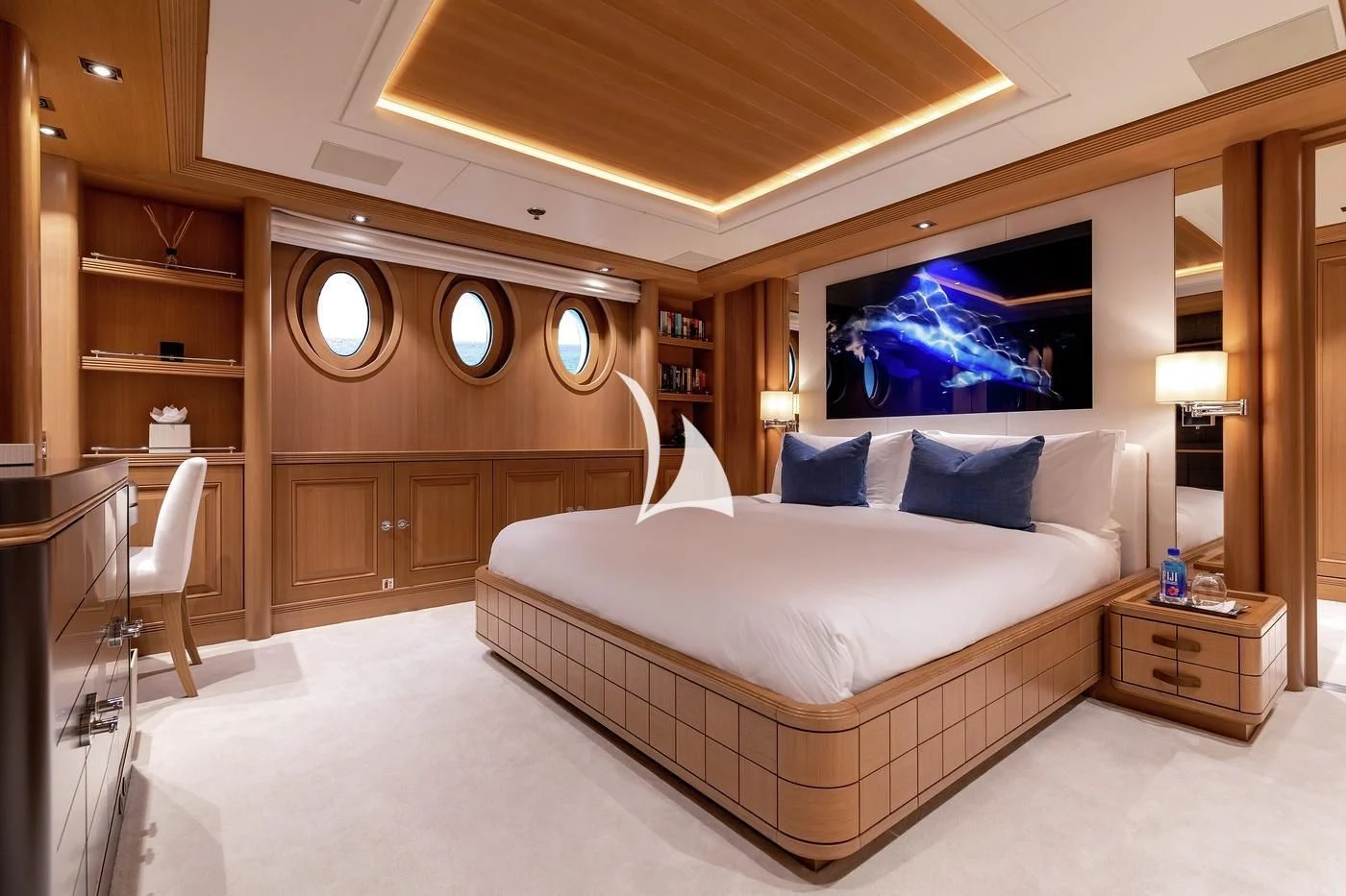 a bedroom with a large bed aboard DEJA TOO Yacht for Sale