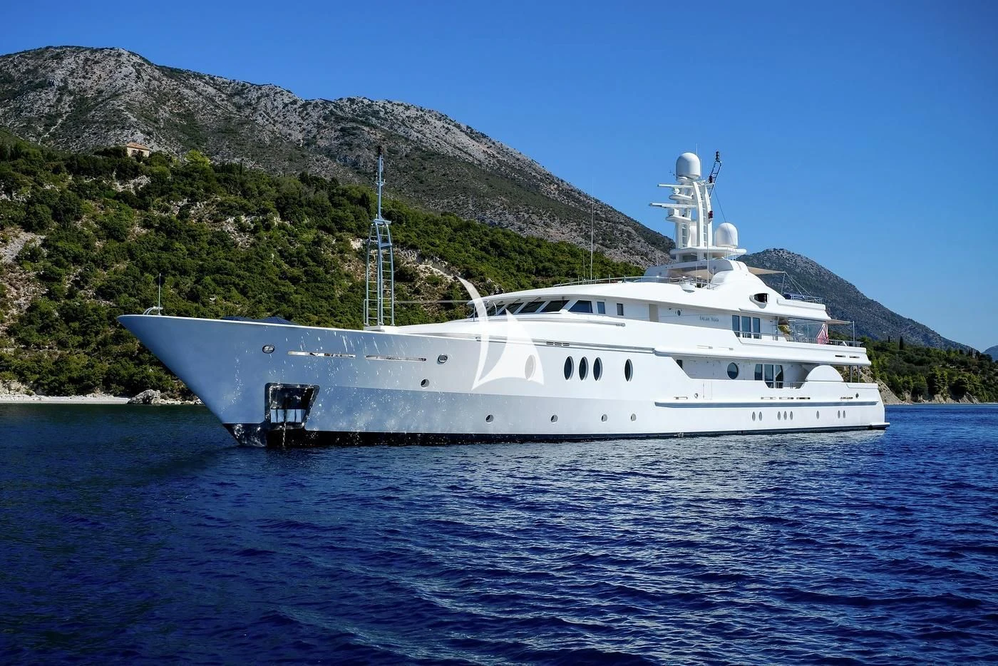 a white yacht on the water aboard DEJA TOO Yacht for Sale