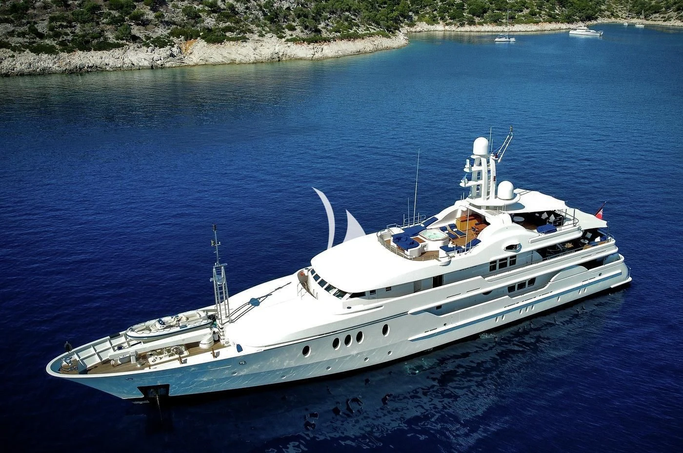 a white boat in the water aboard DEJA TOO Yacht for Sale