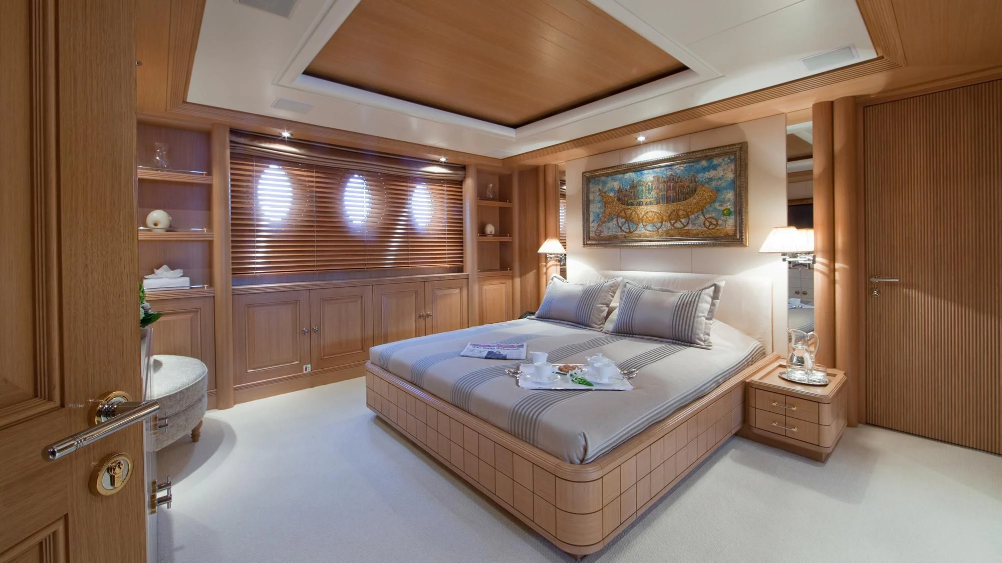 a bedroom with a large bed aboard DEJA TOO Yacht for Sale