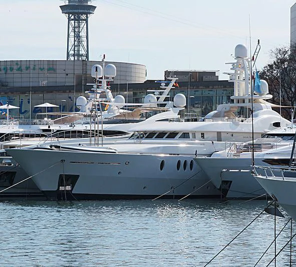 a large white yacht docked aboard DEJA TOO Yacht for Sale
