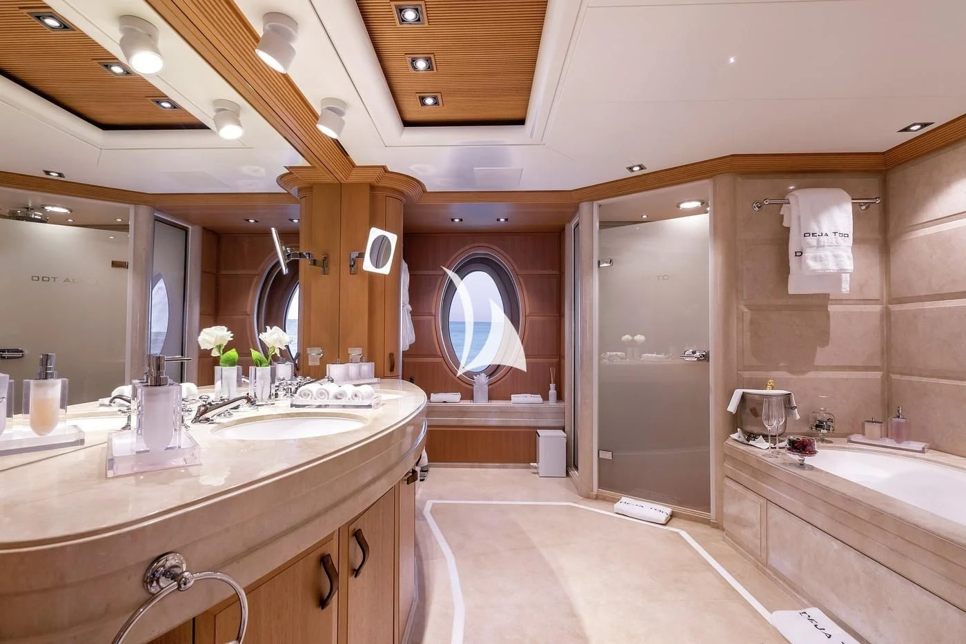 a bathroom with a large mirror aboard DEJA TOO Yacht for Sale