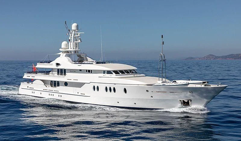 a large white boat in the water aboard DEJA TOO Yacht for Sale