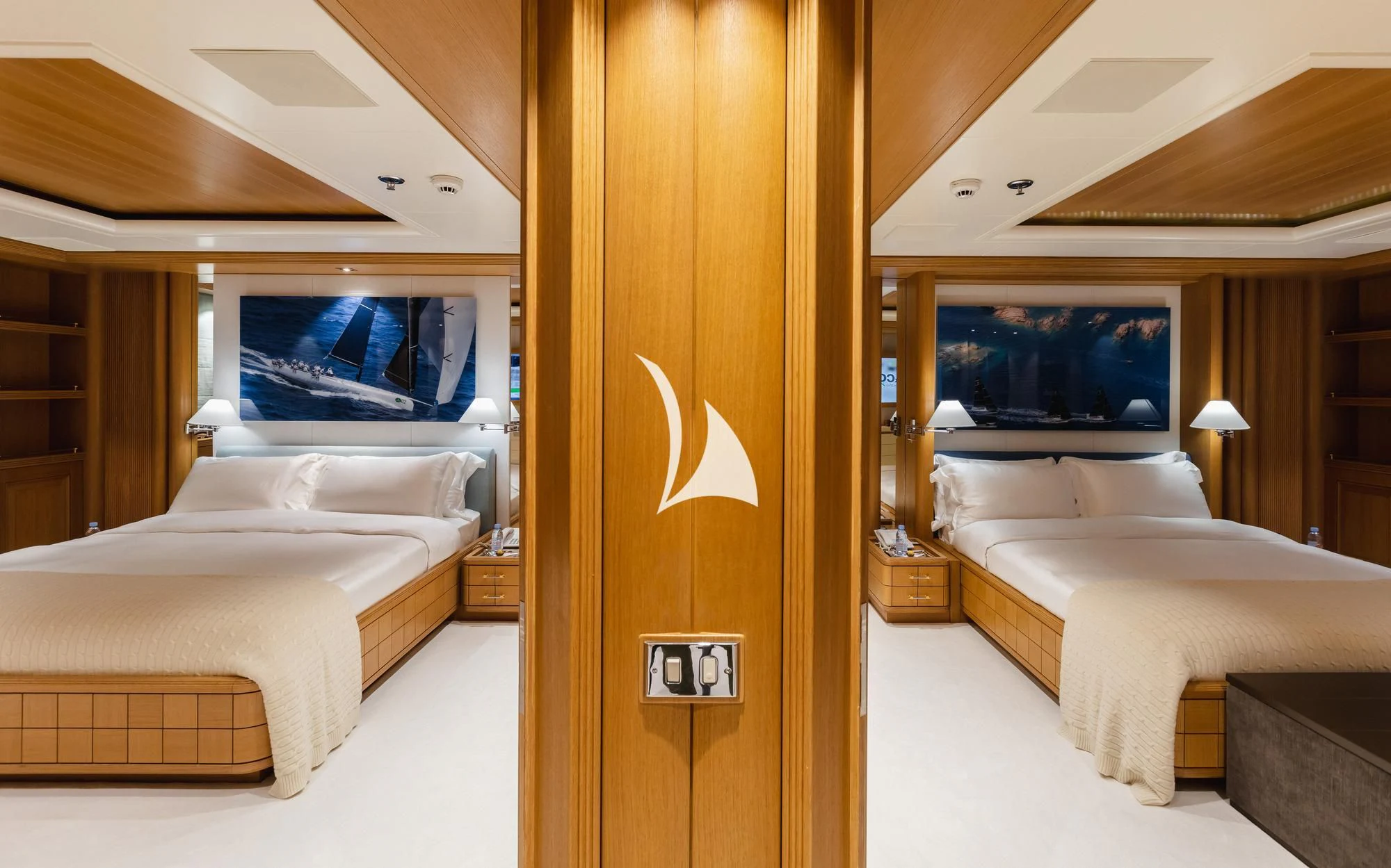 a room with a bed and a television aboard DEJA TOO Yacht for Sale