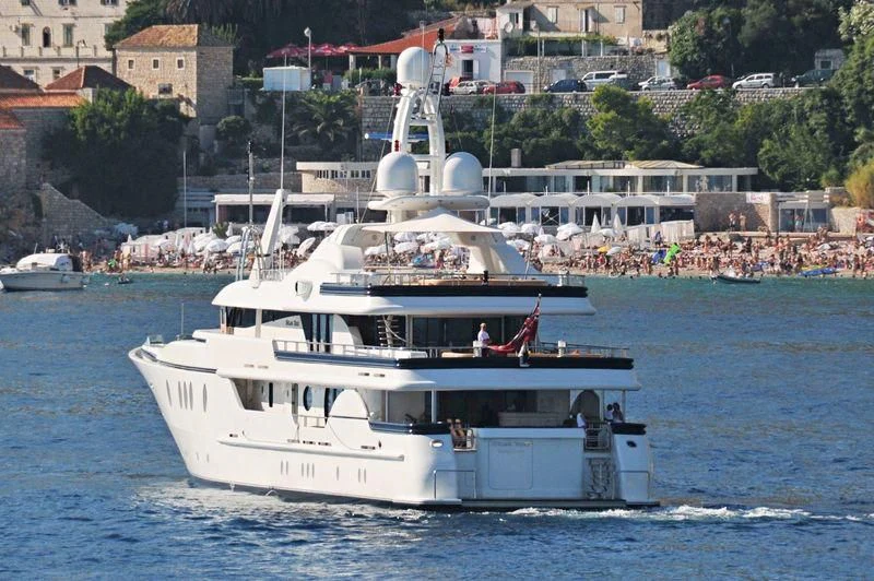 a white boat on the water aboard DEJA TOO Yacht for Sale