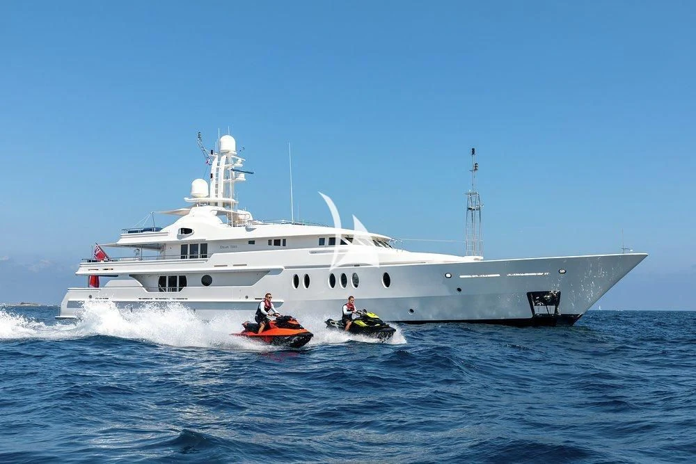 a boat and a boat in the water aboard DEJA TOO Yacht for Sale