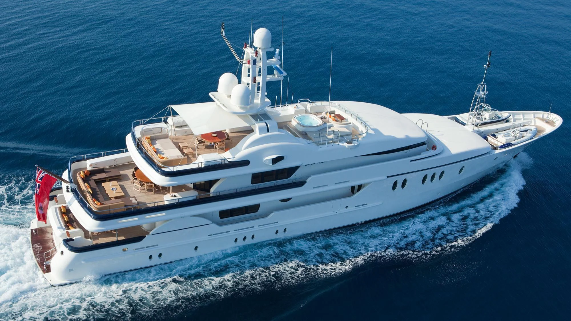a white yacht on the water aboard DEJA TOO Yacht for Sale