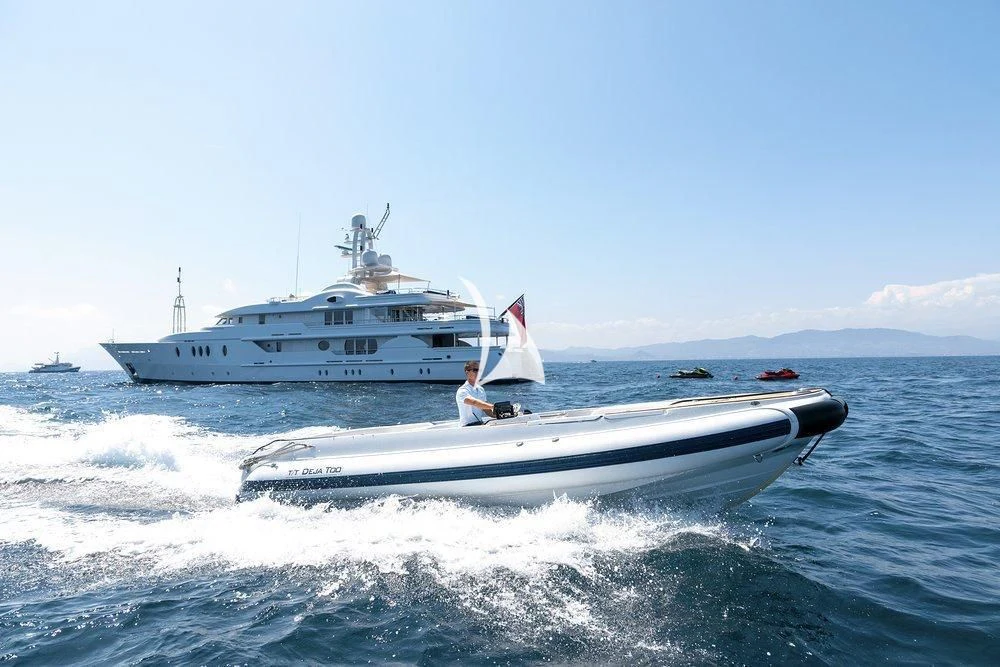 a person on a boat aboard DEJA TOO Yacht for Sale