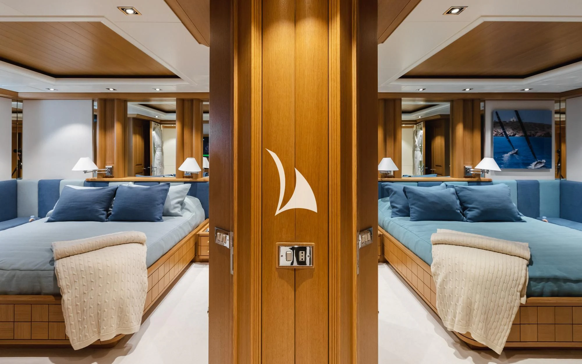 a room with a bed and a desk aboard DEJA TOO Yacht for Sale