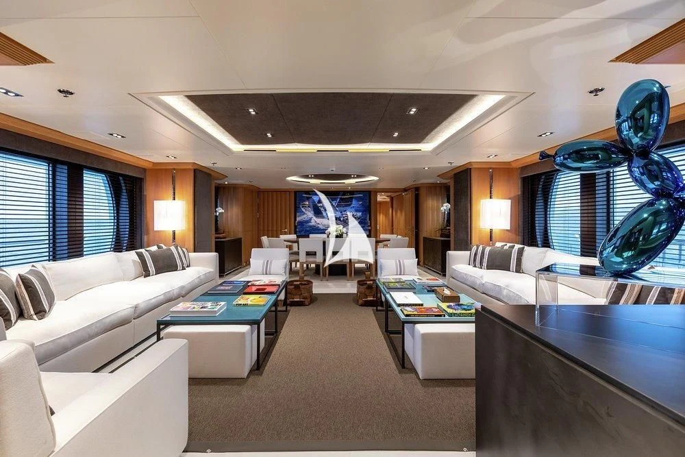 a living room with a large window aboard DEJA TOO Yacht for Sale