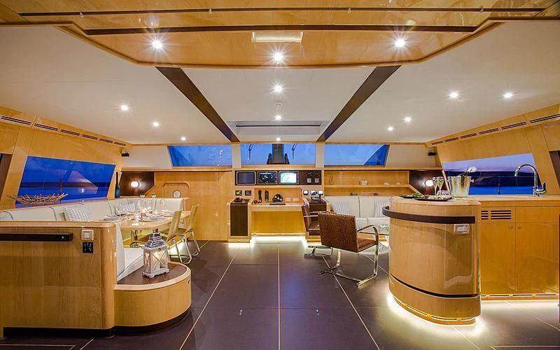 a large kitchen with a large island aboard WINDQUEST Yacht for Sale