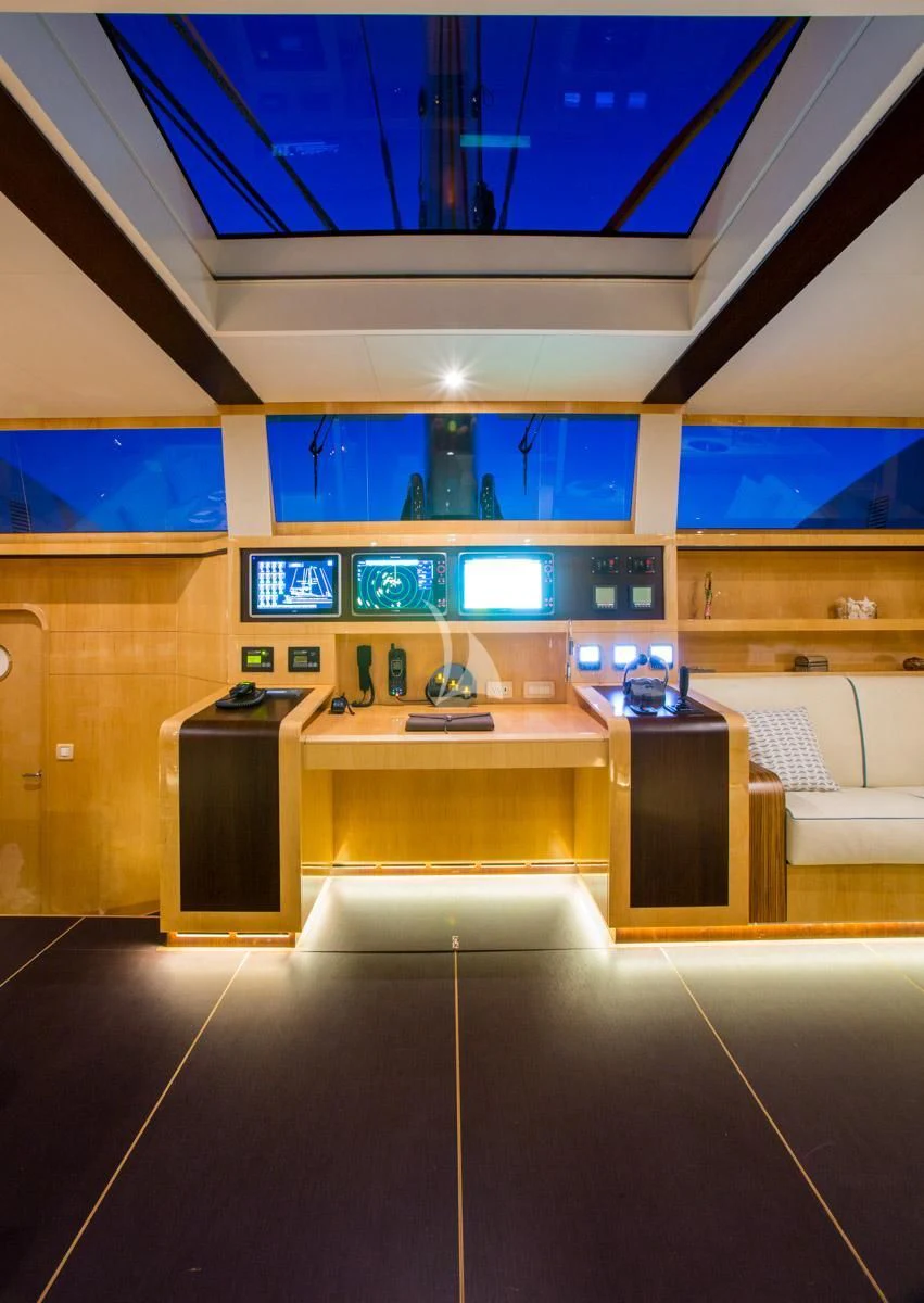 a kitchen with a counter and cabinets aboard WINDQUEST Yacht for Sale