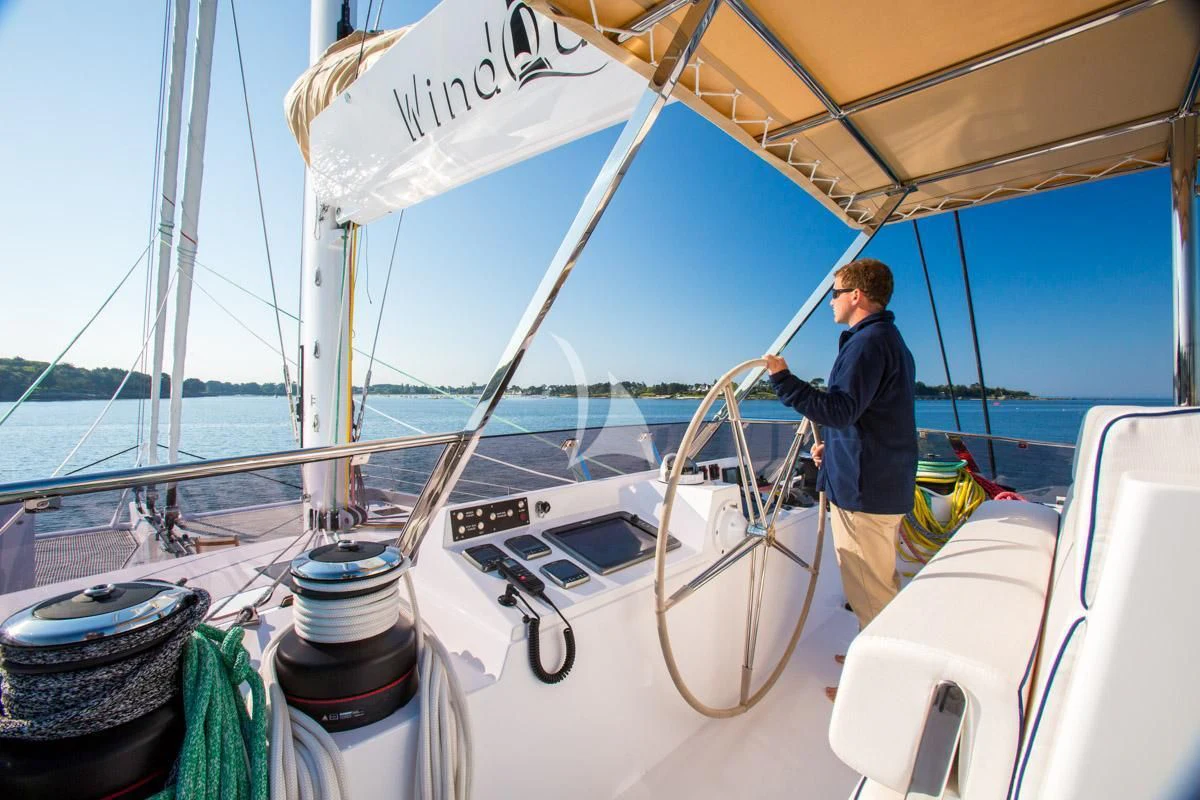 a person on a boat aboard WINDQUEST Yacht for Sale