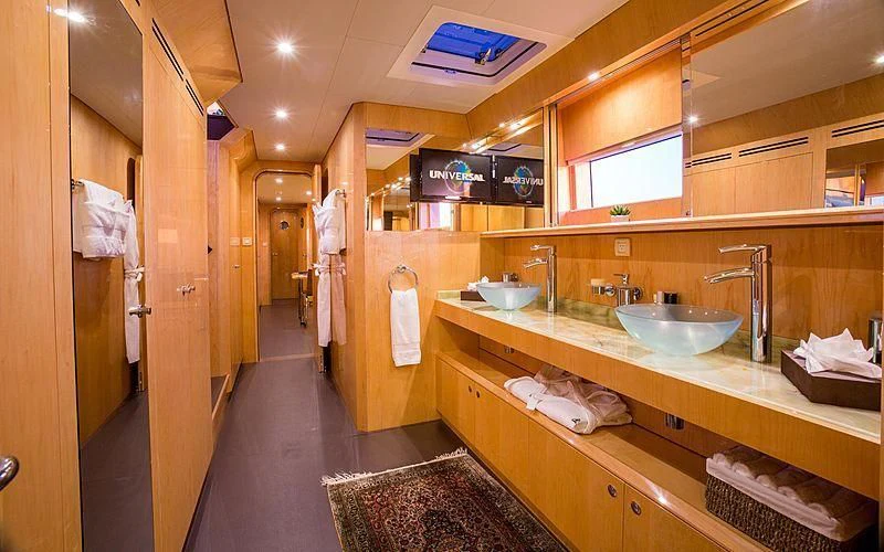 a bathroom with a sink and countertop sinks aboard WINDQUEST Yacht for Sale