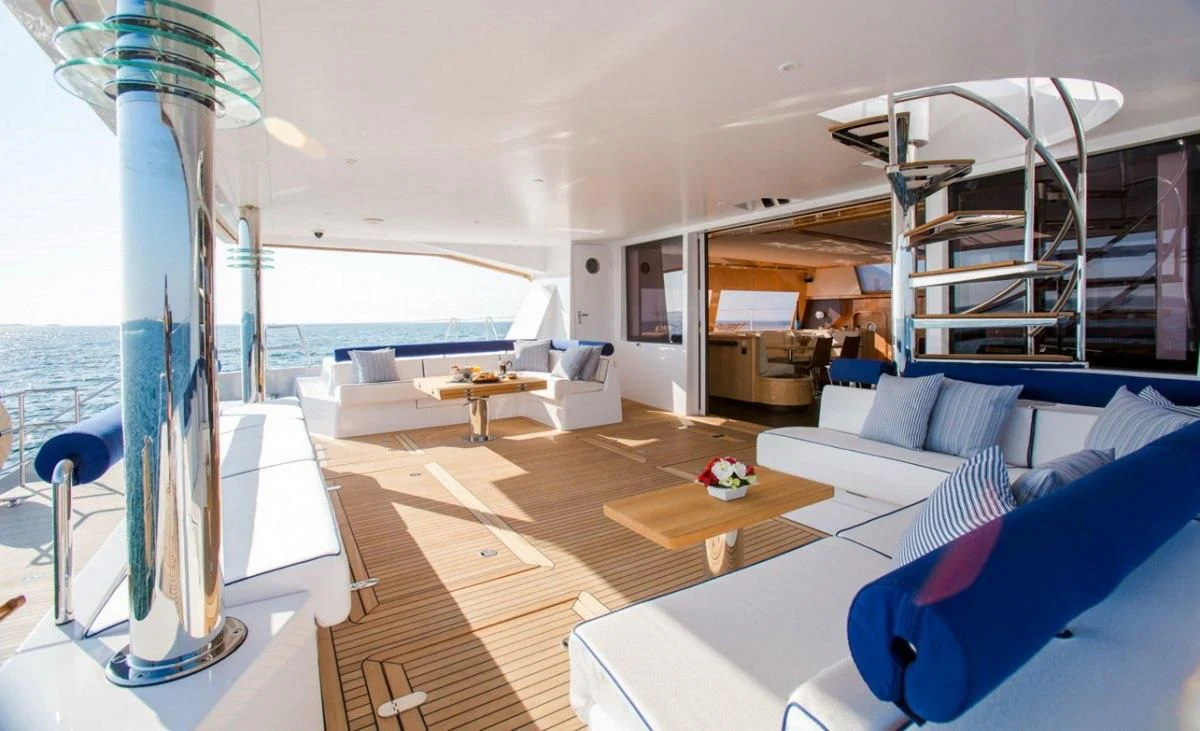 a living room with a large window aboard WINDQUEST Yacht for Sale