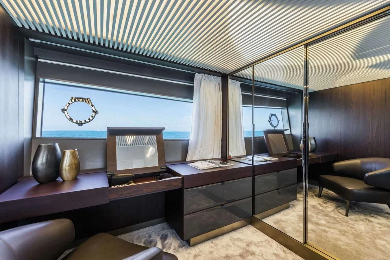 a room with a bed and a couch aboard LADY G Yacht for Sale