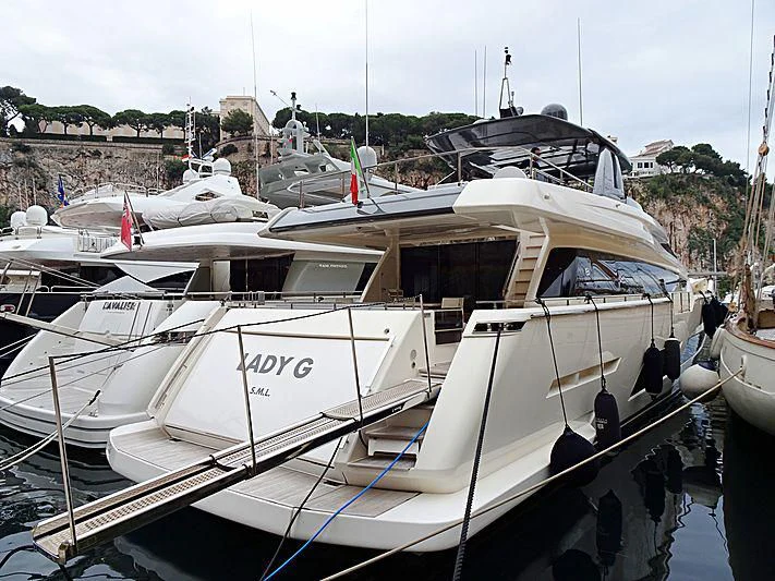 a group of boats are parked in a harbor aboard LADY G Yacht for Sale