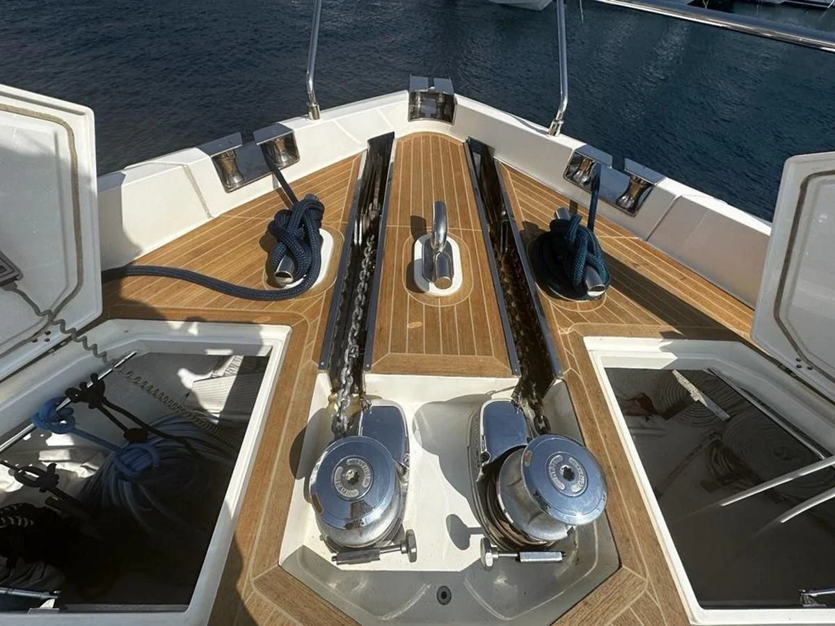 a guitar on a table aboard LADY G Yacht for Sale