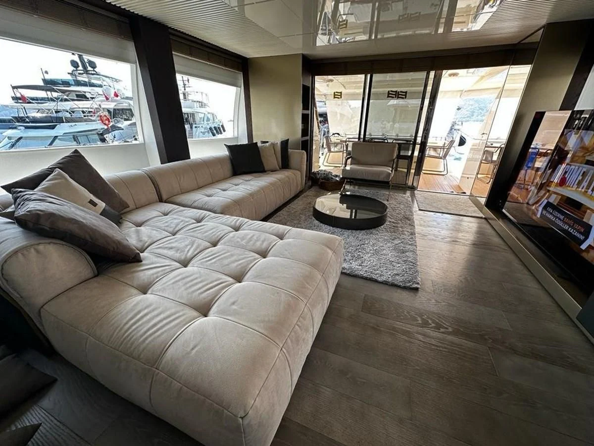 a living room with a couch aboard LADY G Yacht for Sale
