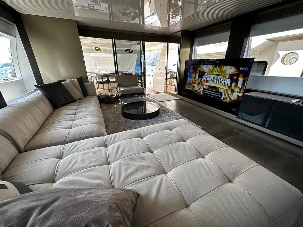 a couch in a room aboard LADY G Yacht for Sale