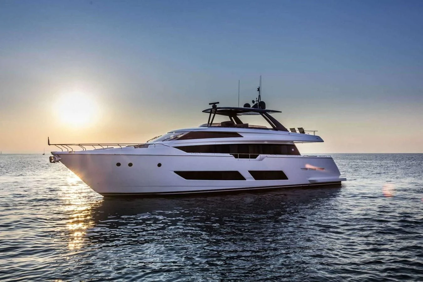 a white yacht on the water aboard LADY G Yacht for Sale