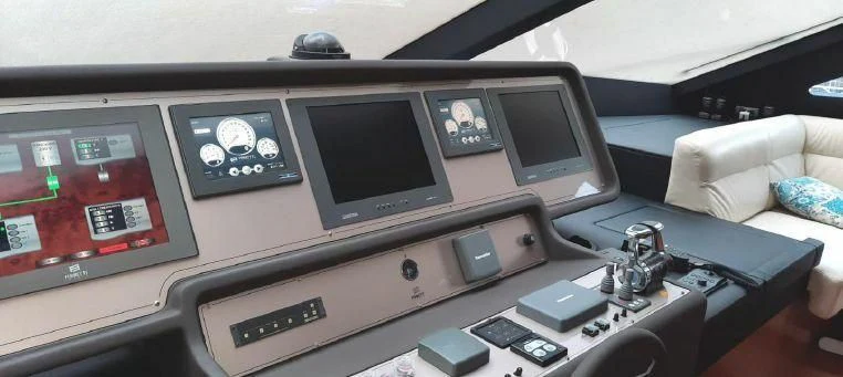 a table with computers and electronics aboard LADY G Yacht for Sale
