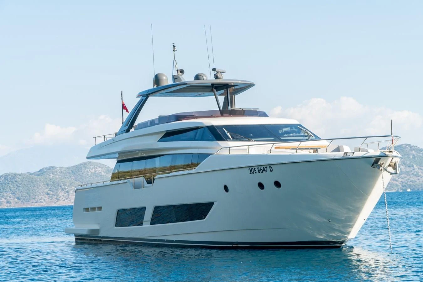 a white yacht in the water aboard LADY G Yacht for Sale