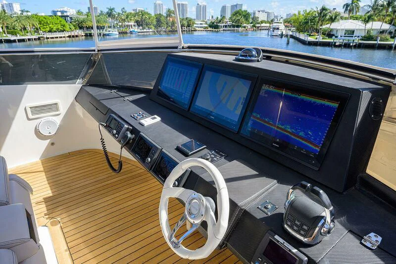 a group of monitors on a table aboard LADY NADIA Yacht for Sale
