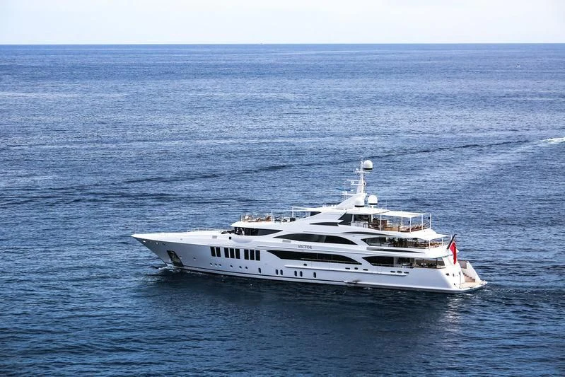 a white boat in the water aboard VECTOR Yacht for Sale