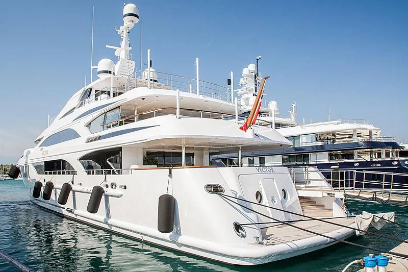 a boat docked at a pier aboard VECTOR Yacht for Sale