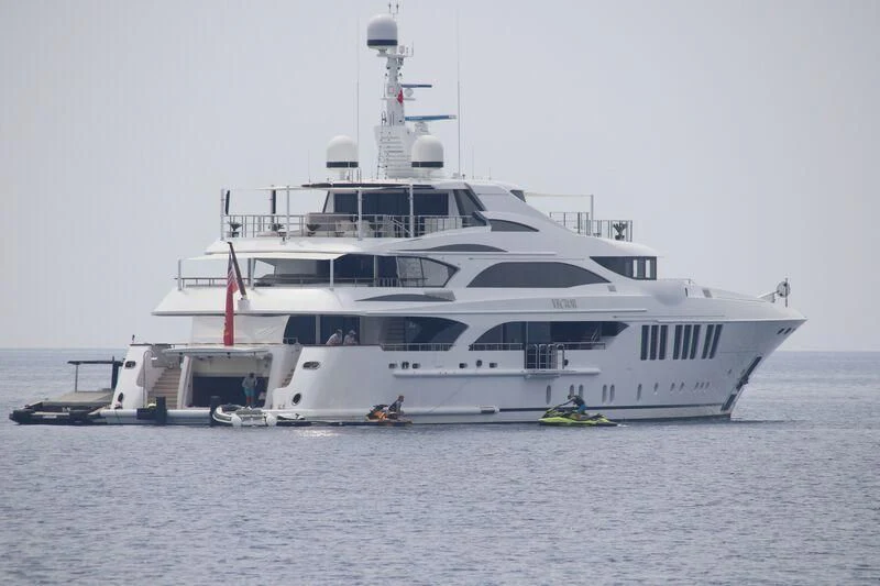 a large white boat in the water aboard VECTOR Yacht for Sale