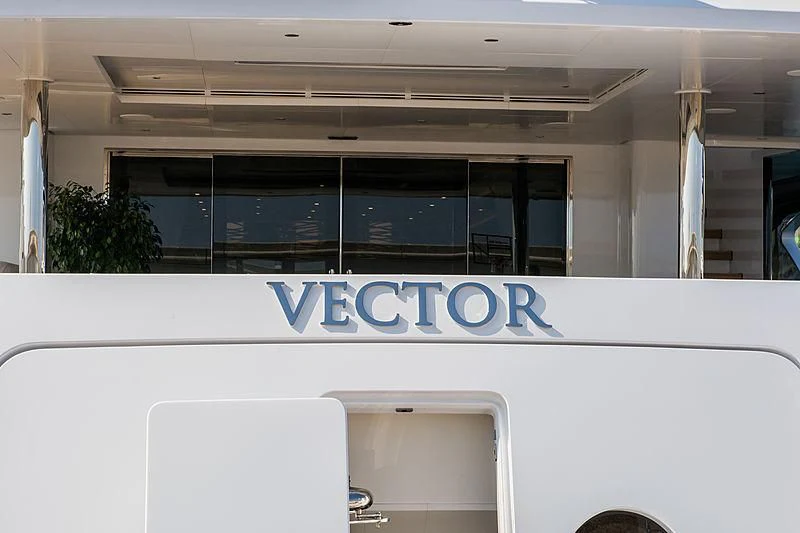 a white building with a sign on the front aboard VECTOR Yacht for Sale