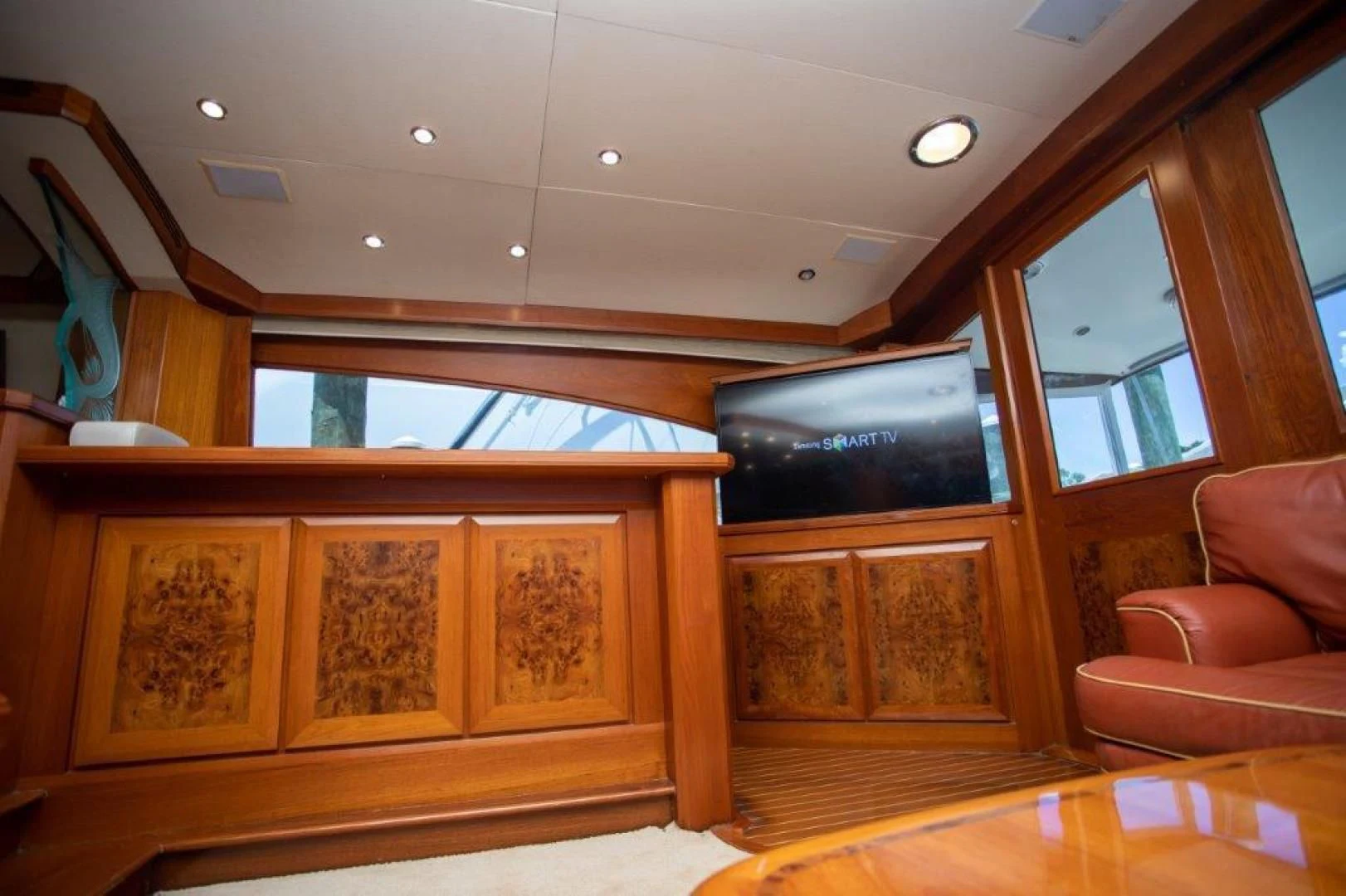 a room with a couch and a television aboard PULLIN WIRE Yacht for Sale