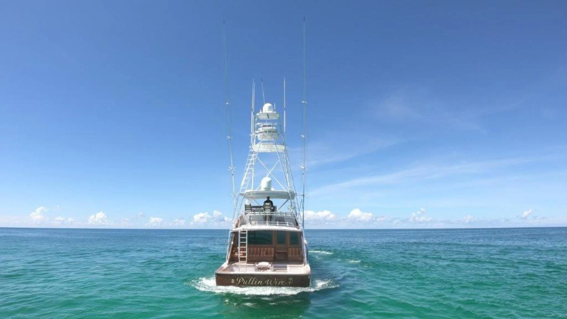 a boat in the water aboard PULLIN WIRE Yacht for Sale