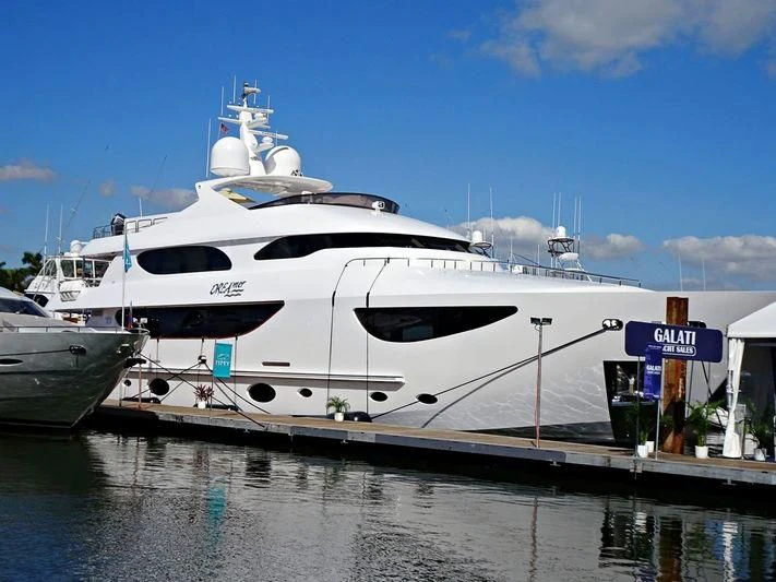 a couple of large yachts aboard TRUE NORTH Yacht for Sale