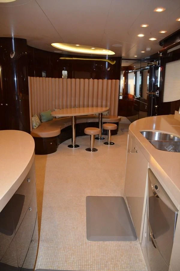 a kitchen with a sink and a bar aboard TRUE NORTH Yacht for Sale