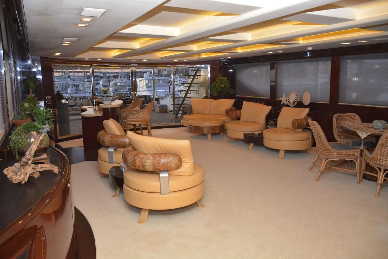 a room with a couch and chairs aboard TRUE NORTH Yacht for Sale