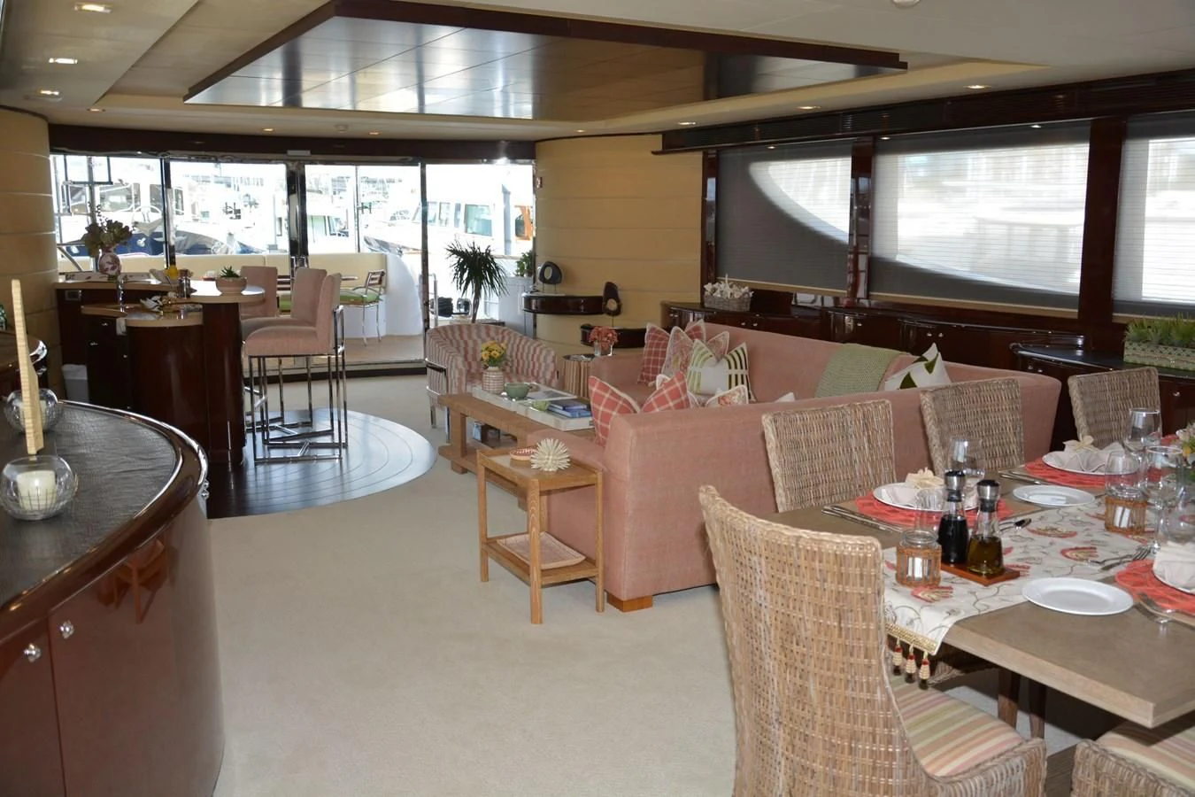 a room with tables and chairs aboard TRUE NORTH Yacht for Sale
