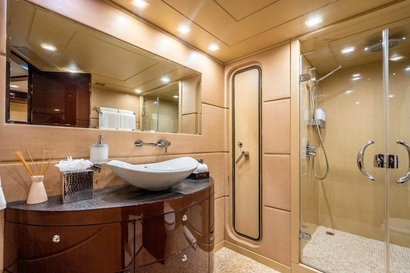 a bathroom with a sink and shower aboard TRUE NORTH Yacht for Sale