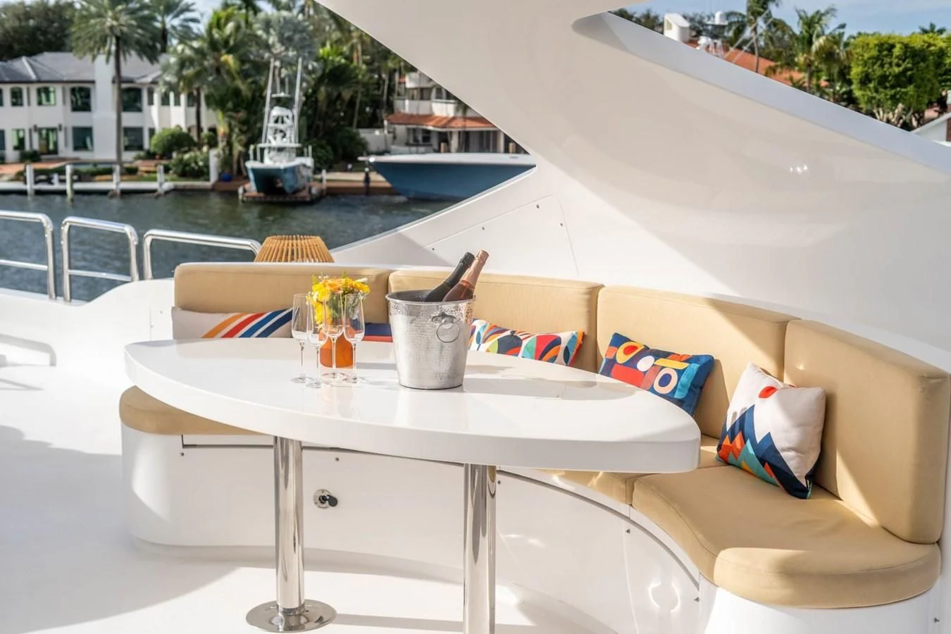 a table with a glass on it aboard TRUE NORTH Yacht for Sale